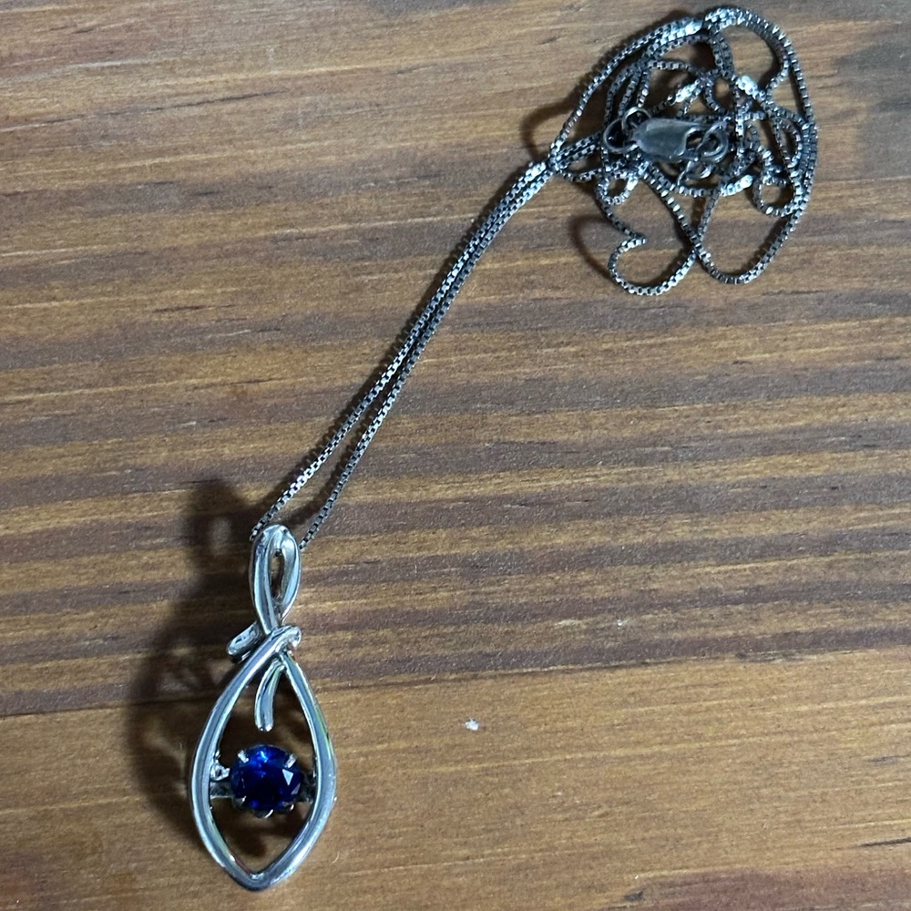 Elegant Silver Pendant Necklace with Sapphire Gemstone